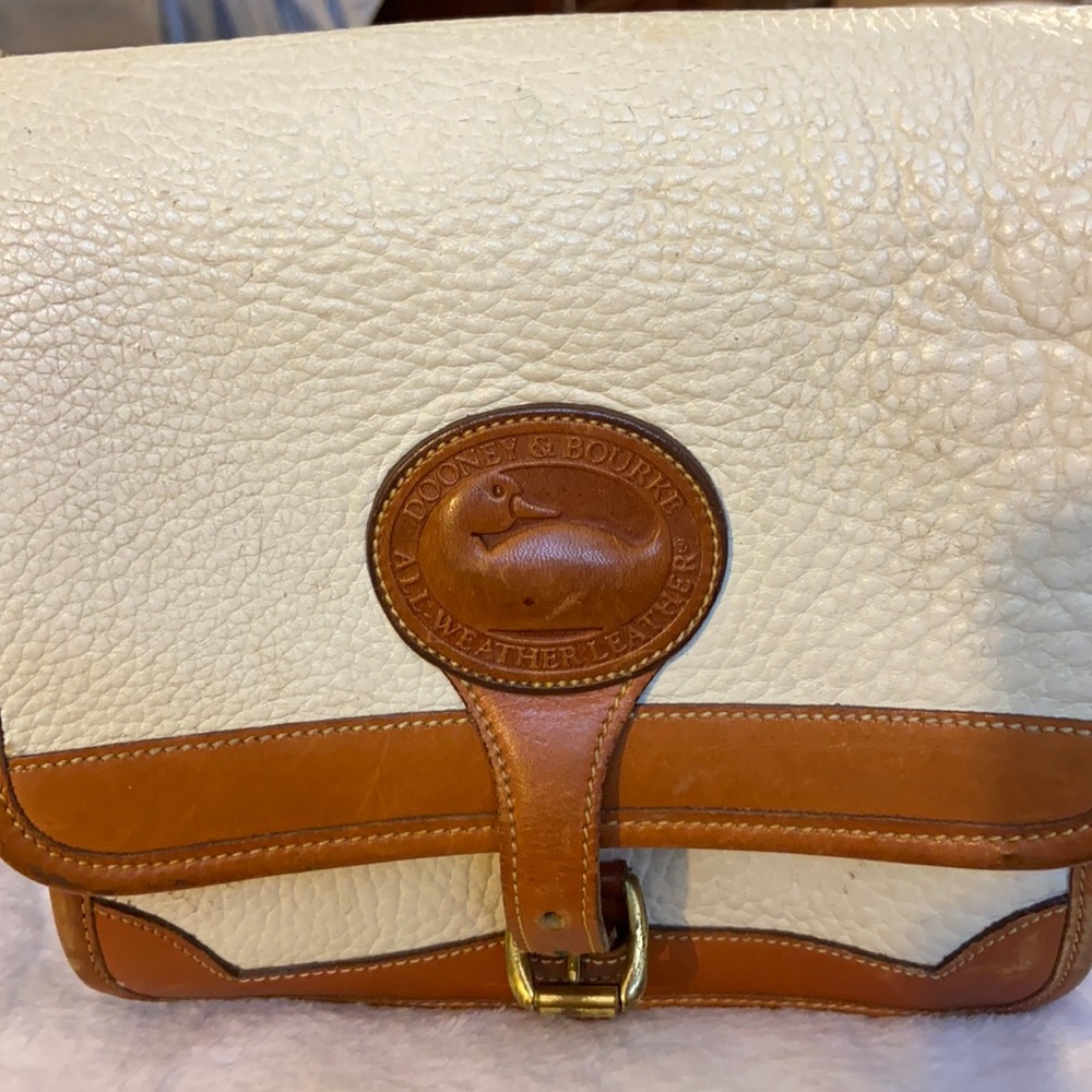 White and brown DOONEY and BOURKE shoulder hand bag.